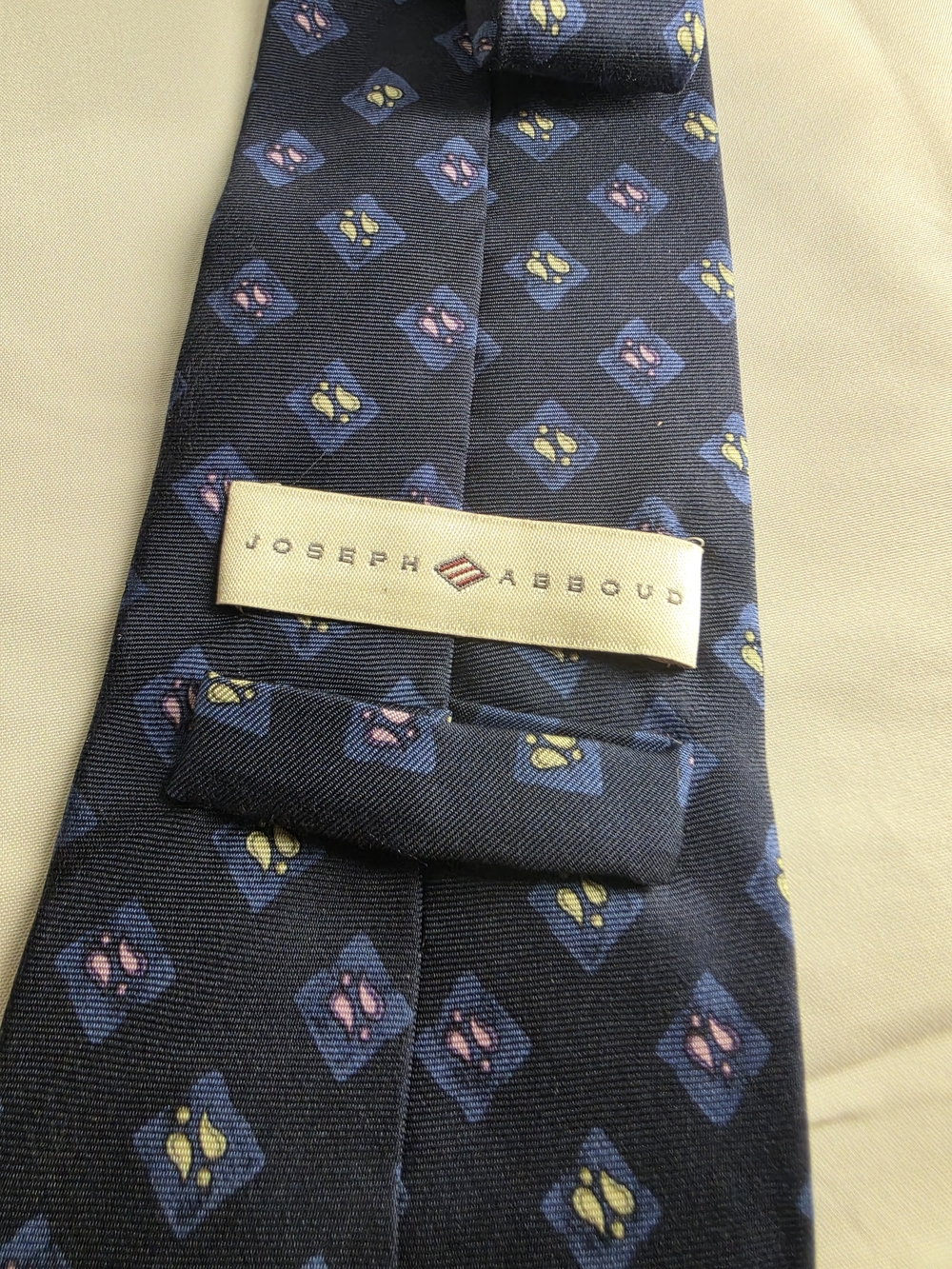 Joseph Abboud Navy Silk Tie with Blue, Pink and Yellow Motif